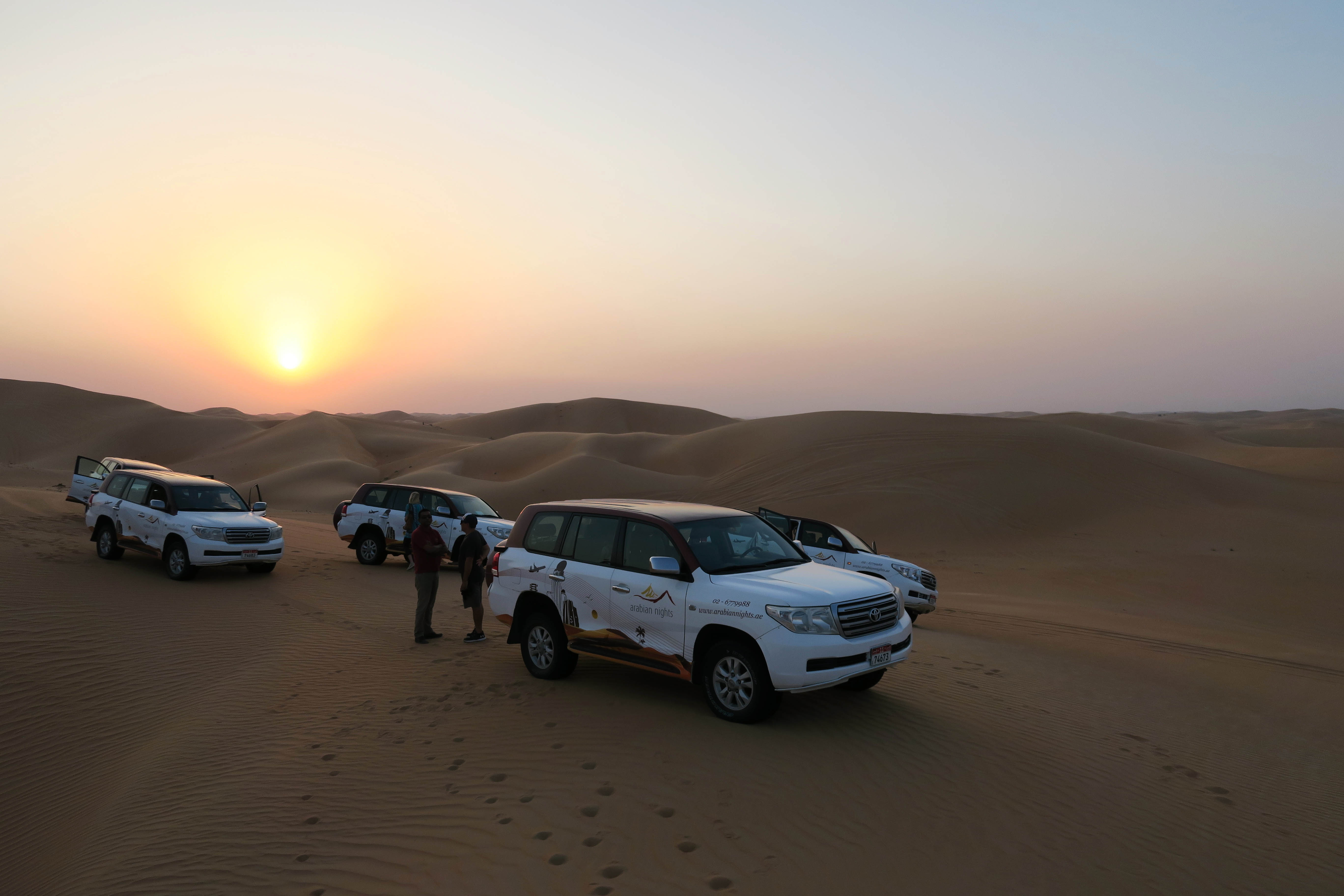 Going to Dubai or Abu Dhabi in the United Arab Emirates and looking for more info on which desert safari is best for families. Here is all the info you need to know about things to do on a Dubai desert safari with kids including: camel riding, sand dunes, sandboarding, evening safari, dune bashing, henna tattoos, belly dancing, camel farm and so much more . Easy, safe, and fun experiences for your next family holiday to UAE. #desertsafari #dubai #uae #abudhabi #camelriding #sandboarding